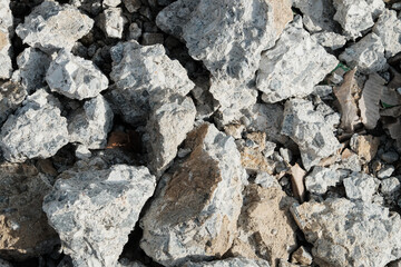 Large concrete stones. Construction waste after dismantling the old building. Close-up