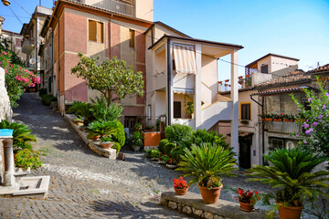 A characteristic street in Morolo, a medieval village in the province of Frosinone in Italy. - obrazy, fototapety, plakaty