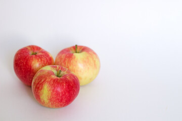 red apples on a white background