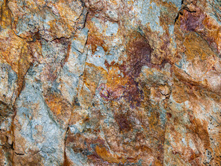 texture de rocher rouge orange et bleu 