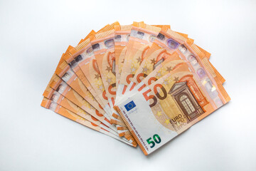 Fifty euro banknotes money, european currency on a white background. Closeup view, finance theme