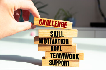 Wooden blocks with words 'Challenge'. Business concept
