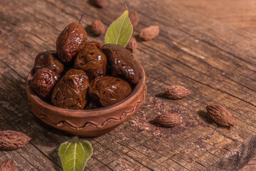 Sun-dried olives in a ceramic bowl