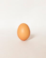 Eggs isolated on a bright background. Front photo. Egg wallpapers. Design, visual arts, minimalism. Egg templates. Organic chicken egg concept. Healthy organic food and diet concept. Focus blur.