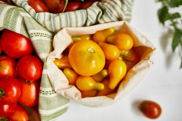 Market delivary of Different kinds of tomatoes in eco textile bag, Zero waste