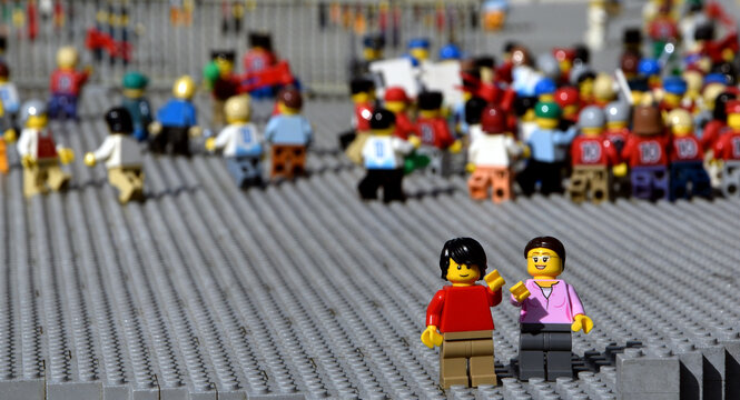 Editorial illustrative image of lego minifigures in legoland adventure park