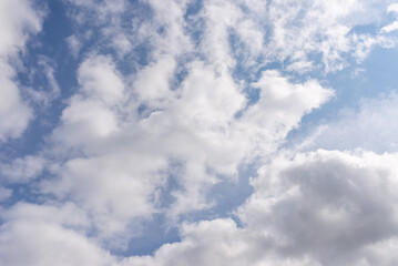 Obraz premium blue sky with cloud closeup.Blue sky background with white clouds.Summer day.