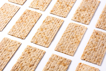 Traditional matzah bread pattern on white background