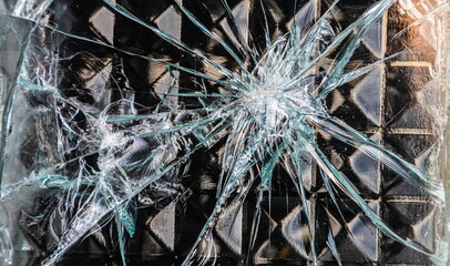 fragment of an old wall made of cracked blue glass bricks as a background texture composition