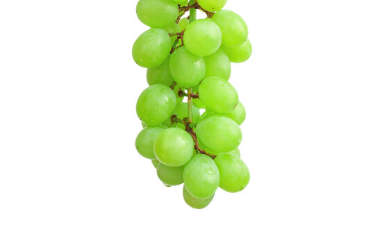 Green grapes close-up isolated on a white background