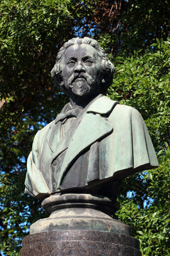 Chuhuiv, Ukraine - August 24, 2021: Monument to Ilya Repin by Matvey Manizer. Repin was a prominent Ukrainian and Russian realist painter of the 19th century.