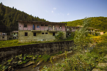 Fototapeta na wymiar homes used by miners, abandoned, somewhere in Romania.