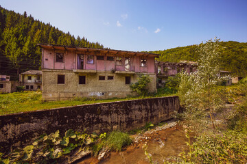 Fototapeta na wymiar homes used by miners, abandoned, somewhere in Romania.