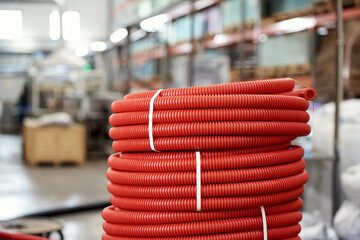 Large roll of plastic corrugated pipe for insulating electrical wires