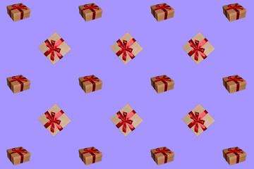 Pattern of gift boxes with a bow made with ribbon isolated on a purple background