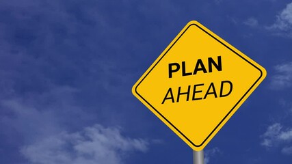 Plan Ahead Road Sign on Clear Blue Sky with Rapid Moving Clouds