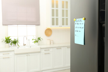 To do list on fridge in kitchen. Space for text