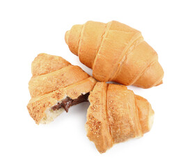 Tasty croissants with chocolate on white background, top view