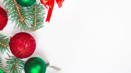 Christmas composition. Gifts, spruce branches, red decorations on a white background. Christmas, winter, new year concept. copy space