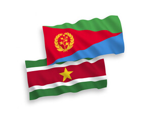 National vector fabric wave flags of Eritrea and Republic of Suriname isolated on white background. 1 to 2 proportion.
