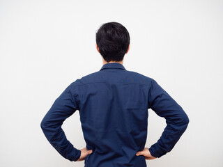 Man standing turn back hand at his waist white background