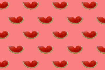 Watermelon pattern. Red watermelon on a red background. Summer concept. Flat lay, top view
