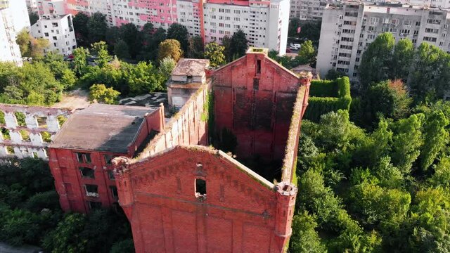 1853 Assan's steam mill in Bucharest. slowlly reclaimed by nature.The first industrial establishment based on mechanized work and steam power was introduced in 1853, in the form of the Assan Steam Mil