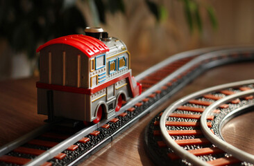 Children's railway with a gray train, children's toy