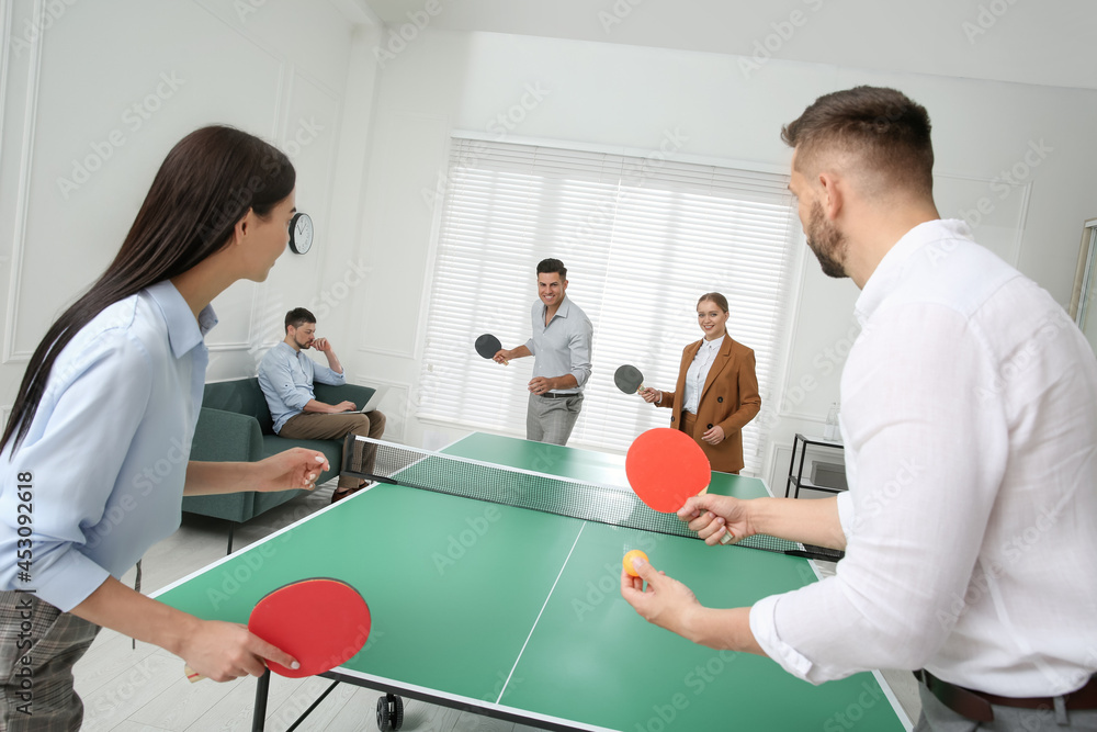 Sticker Business people playing ping pong in office