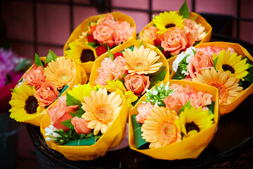 Various kinds of flowers in a basket
