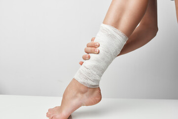 bandaged leg injury close-up health problems