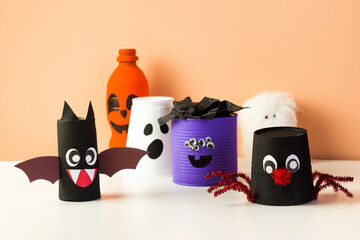 Kids DIY Halloween home activities. Handmade monster, spider and pumpkin. Reuse art from tin can,...