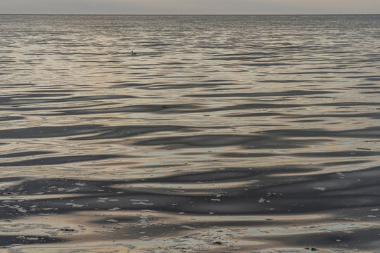 Langrune-Sur-Mer, France - 08 05 2021:  View of the sea from the beach at sunset