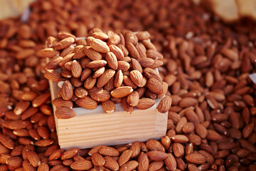 Roasted almonds on display at the market