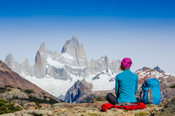 Fototapeta na wymiar Advanture traveler enjoy the view of Fitz Roy Mountain, Patagonia. Mountaineering sport lifestyle concept
