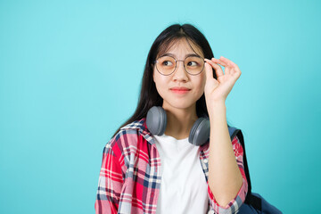 Happy Student. Cheerful Asian Girl Smiling To Camera.