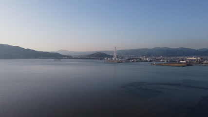 SDGs自然と地球環境！コンビナートの煙突とソラの光