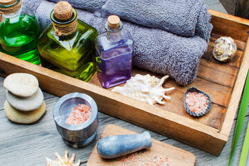 Obraz na płótnie Canvas spa set with towels candles and seashells