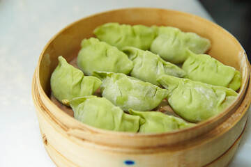 Chinese steamed dumplings in a steamer