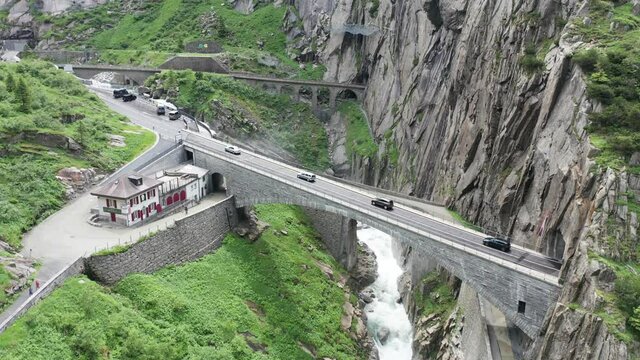 Extreme hight mountain road in swiss alps from aerial view in 4k