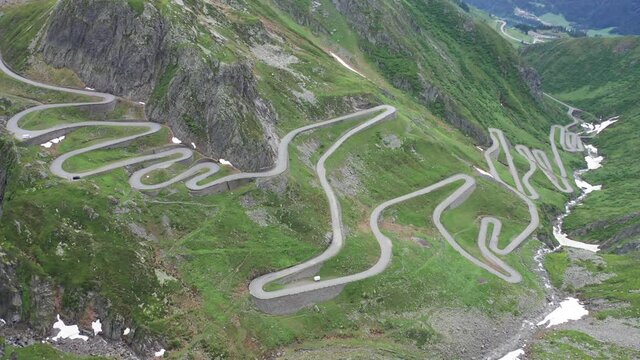 Extreme hight mountain road in swiss alps from aerial view in 4k