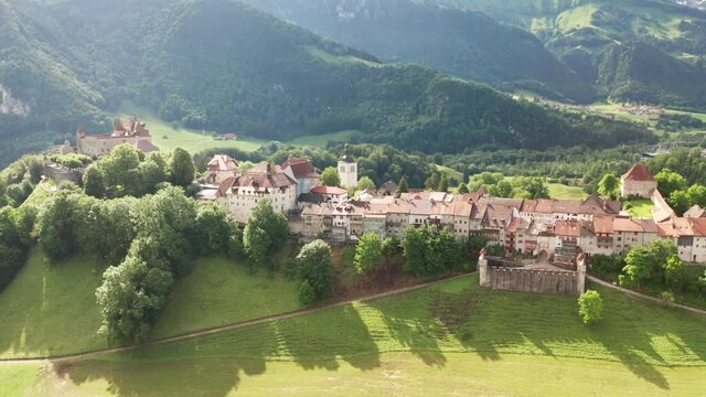 swiss town and castle of Gruyeree from aerial view in 4k
