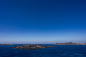 Fototapeta na wymiar Santorini volcano island, Greece. View of Aegean sea and caldera.