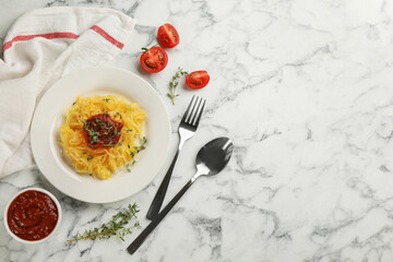 Tasty spaghetti squash with thyme and tomato sauce served on white marble table, flat lay. Space for text