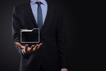Businessman hold folder icon.Document Management System or DMS setup by IT consultant with modern computer are searching managing information and corporate files.Business processing,