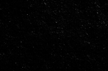 small snowflakes on a black background