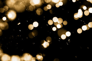 golden bokeh on a black background for use with the screen overlay mode