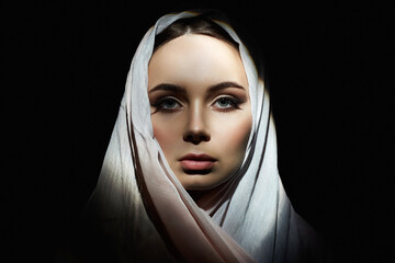 Naklejka premium beautiful young woman in hijab. beauty girl in hood. fashion oriental woman