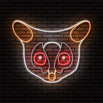 The Senegal bushbaby, Galago senegalensis, the head of an animal in the form of a neon sign. Vector image. Against the background of a brick wall with a shadow.