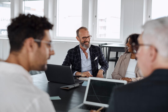 People talking during business meeting